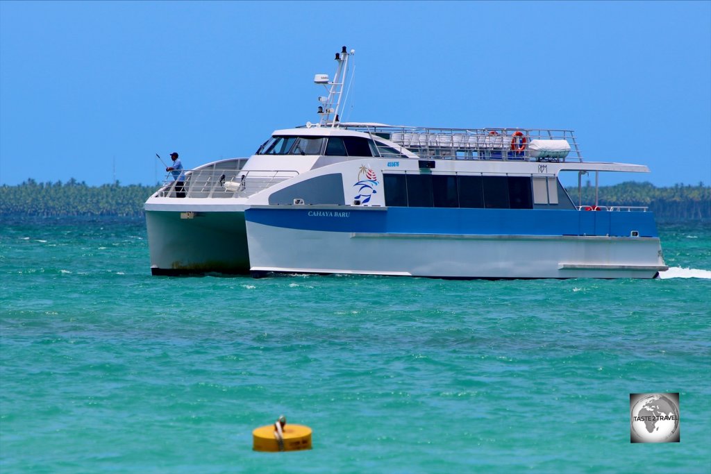 The Cahaya Baru ferry arriving at Home Island.