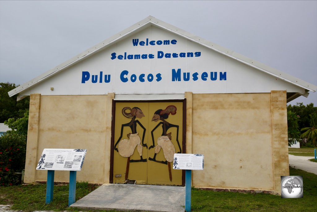 Wayang Kulit puppets adorn the doors of the Pulu Cocos Museum on Home Island Museum.