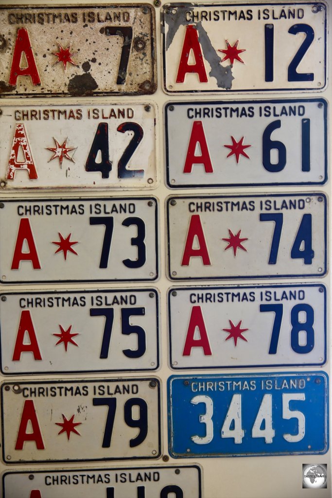 A display of old Christmas Island License plates at the Tai Jin House museum.