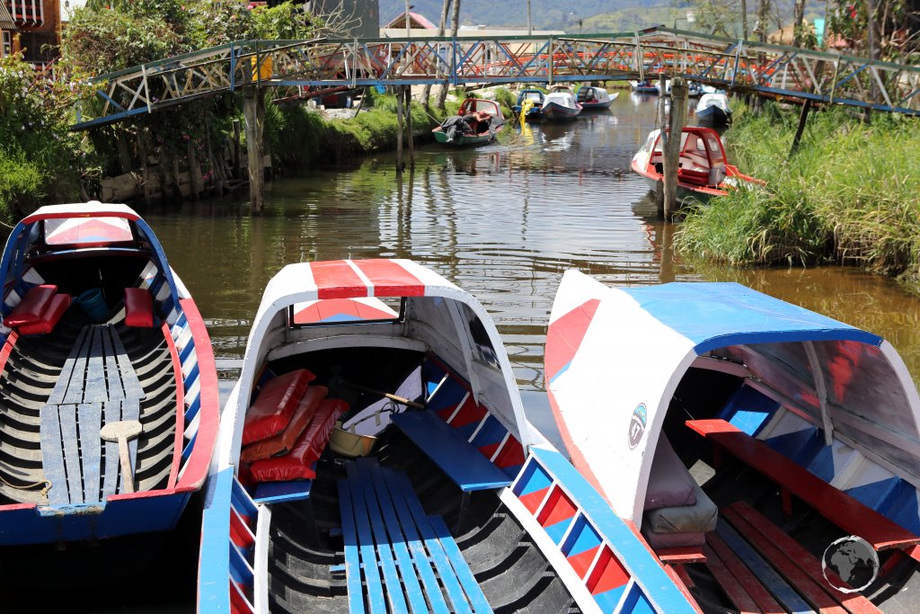 Tour boats at Laguna de la Cocha, waiting to ferry passengers out to the national park on Isla de La Corota.