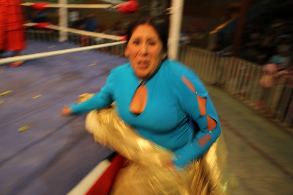 After I photographed her being thrown out of the ring, this cheeky Cholita decided she would playfully slap me, which earned her a round of applause from the audience.