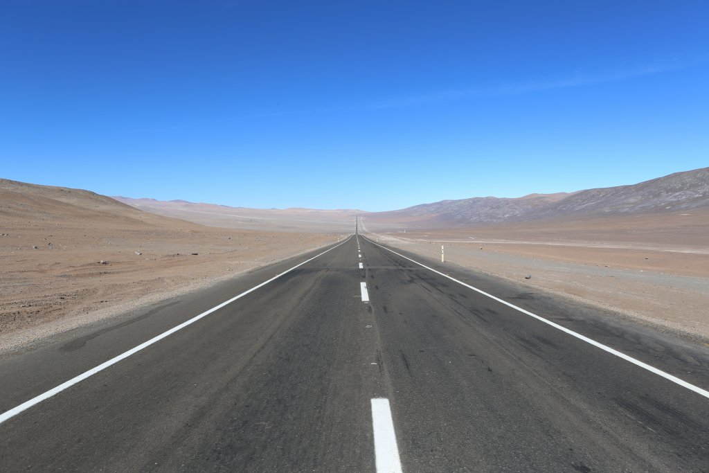 Driving through the Atacama desert, the driest nonpolar desert in the world. The Atacama covers a 1,600 km (990 mi) strip of land in northern Chile.