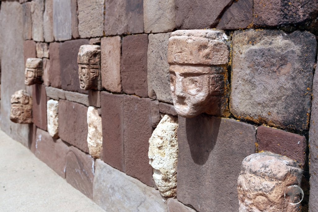 Carved stone Tenon Heads line the walls of Kalasasaya Temple at Tiwanaku. The complex is believed to have been founded around AD 110.