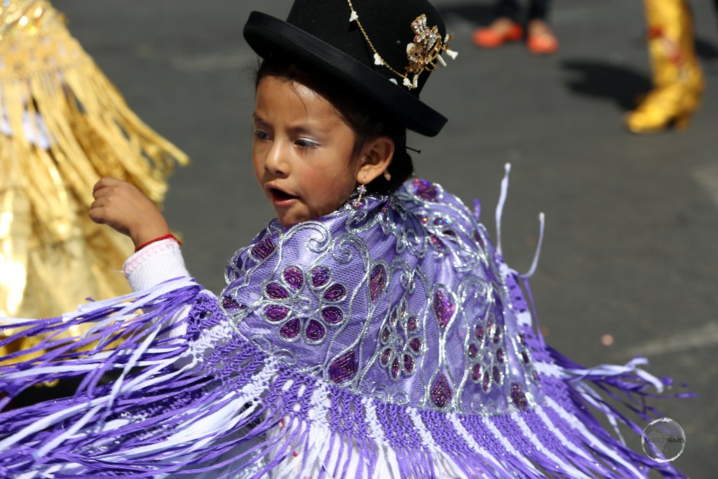 The festival, which is a two day event held around the 8th of September each year, sees thousands of costumed dancers, young and old, parading through the old town of Sucre.
