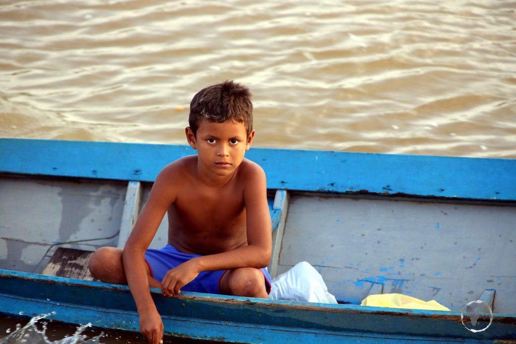 Young boy on the Amazon river near Macapá, Brazil.