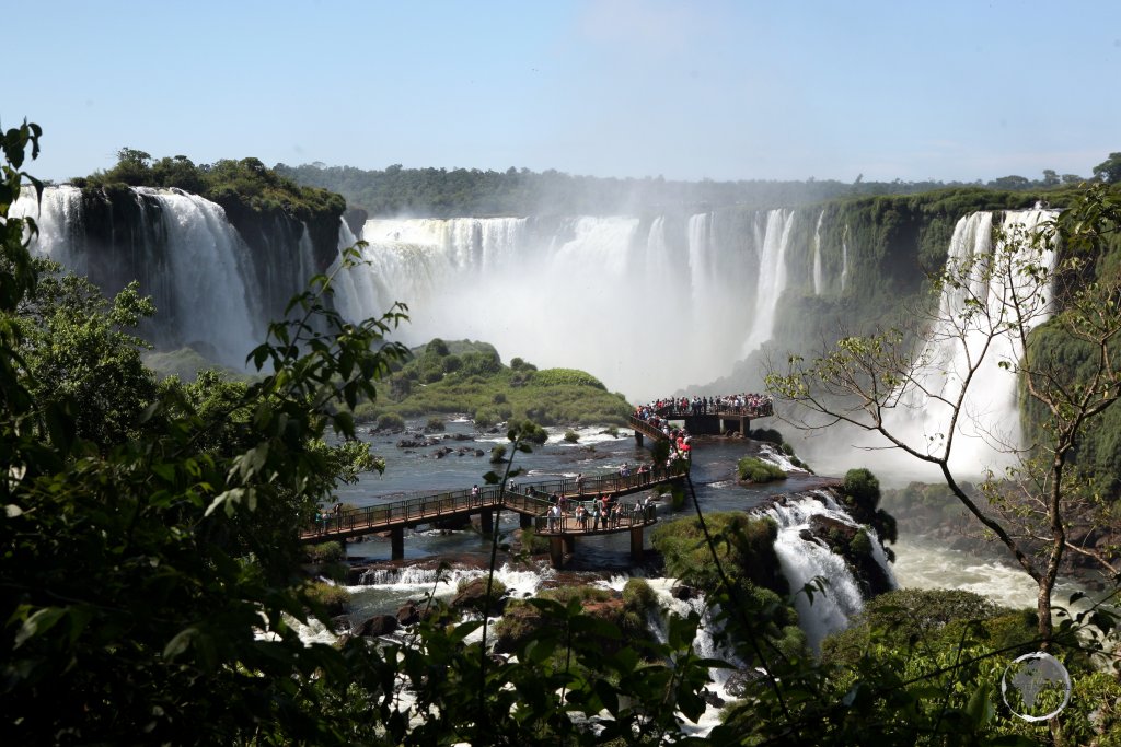 A boardwalk provides a panoramic view of Iguaçu falls from the Brazilian side.