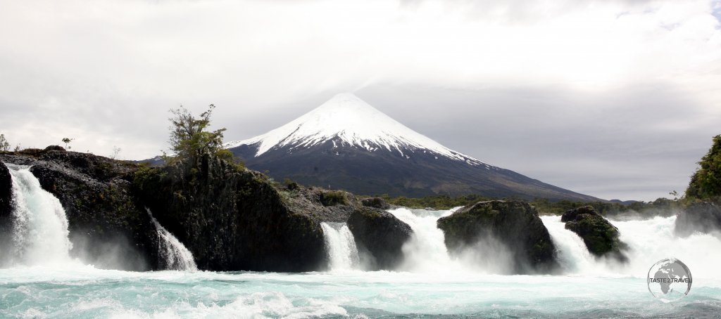 Osorno volcano forms an ideal backdrop to the thundering Petrohué waterfalls, a chute-type waterfall in the upper reach of the Petrohué River in southern Chile.