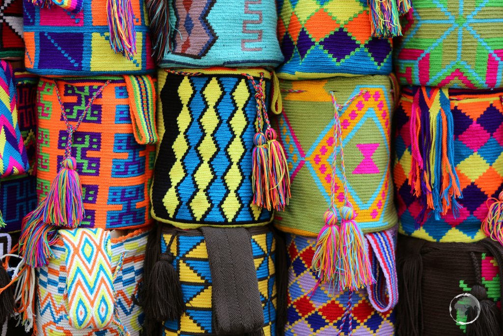Wayuu Mochila bags for sale at a street-side stall in Cartagena old town.