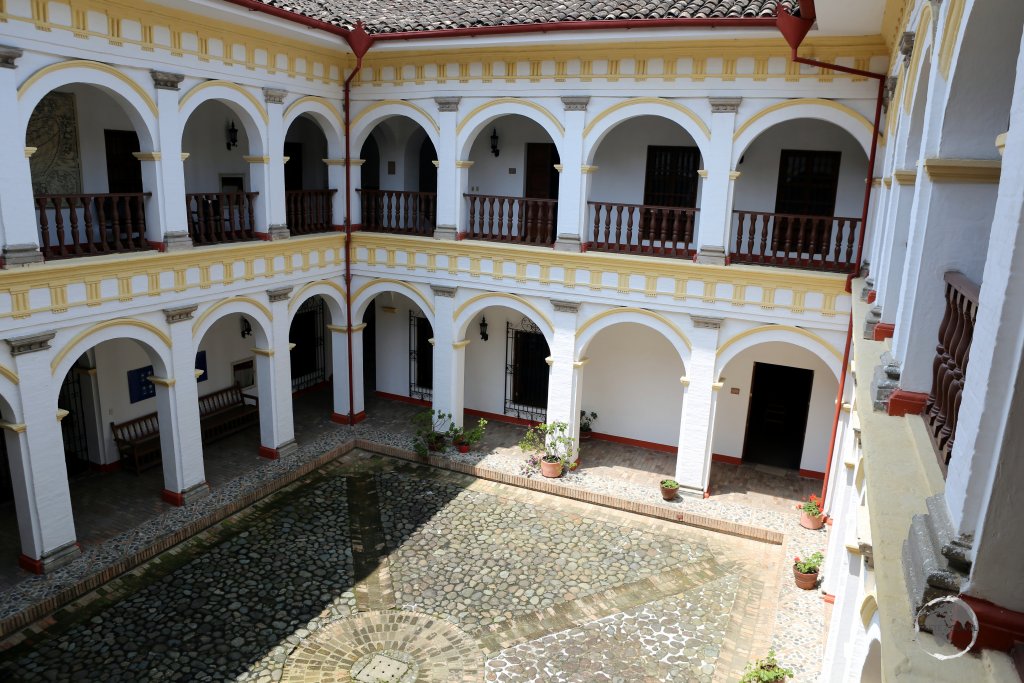 The ornate courtyard of the 'Museo Arte Religioso' (Religious Art Museum) in Popayán, Colombia.