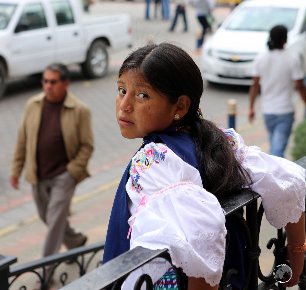 A local Otavaleño native Indian girl in downtown Otavalo.