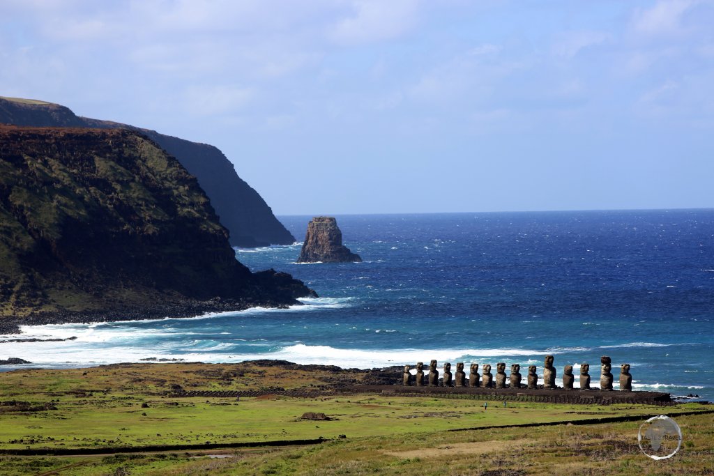A distant view of Ahu Tongariki, where the moai stand with their backs to the sea. The purpose of the statues was to watch over the islands' inhabitants, hence they all face inland.