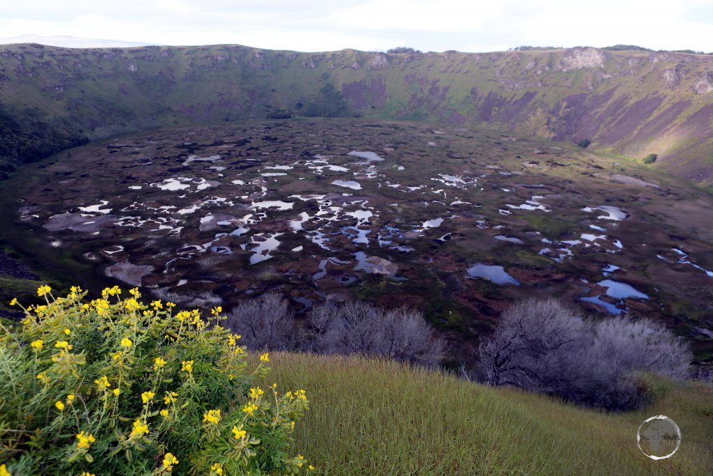 The caldera of Rano Kau, one of three volcanoes that created tiny Easter Island. Located a short drive from Hanga Roa, this circular crater is 1.6 km in diameter and 324 metres in height.