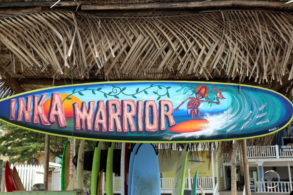 Surf schools line the sandy beach at Máncora, a popular resort town in the Piura Region, on Peru's northwest coast.