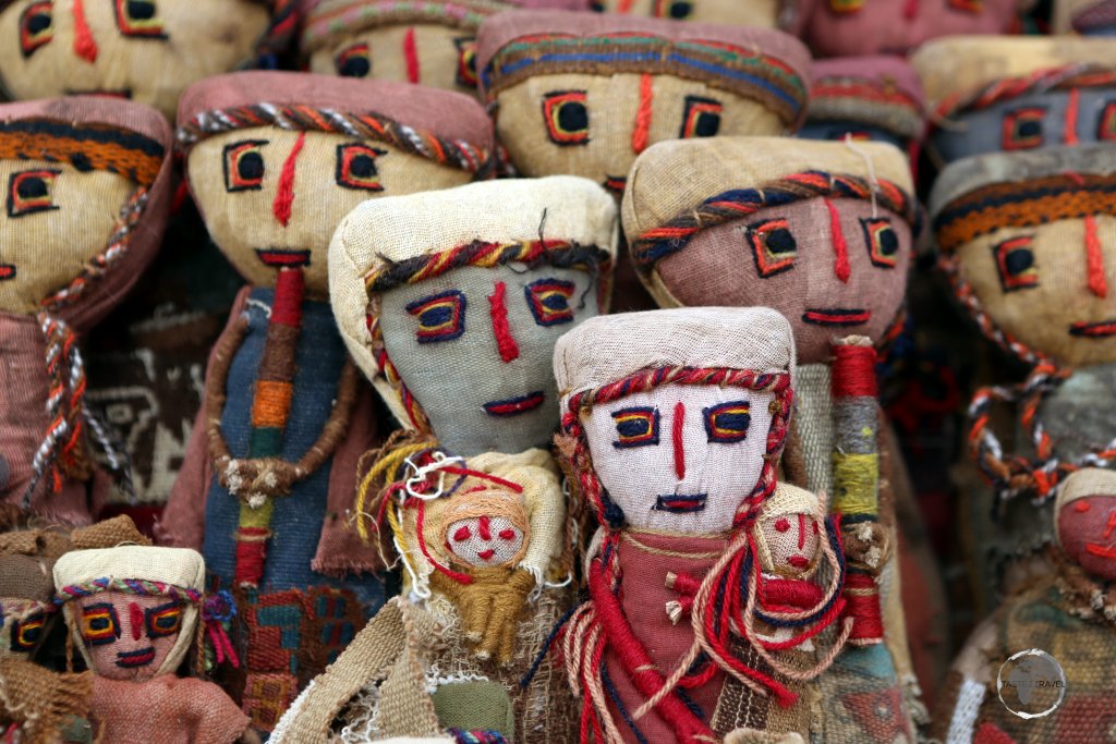 Souvenir dolls for sale in Pisac market, a good place to shop for local Quechua handicrafts.