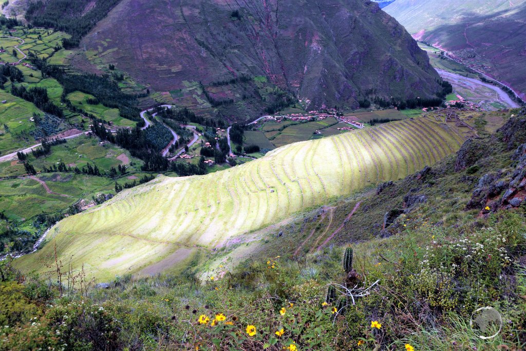 Sunlight illuminates the Inca-built terraces at Pisac, which lies at the eastern end of the Sacred Valley, 32 km (20 mi) northeast of Cusco.