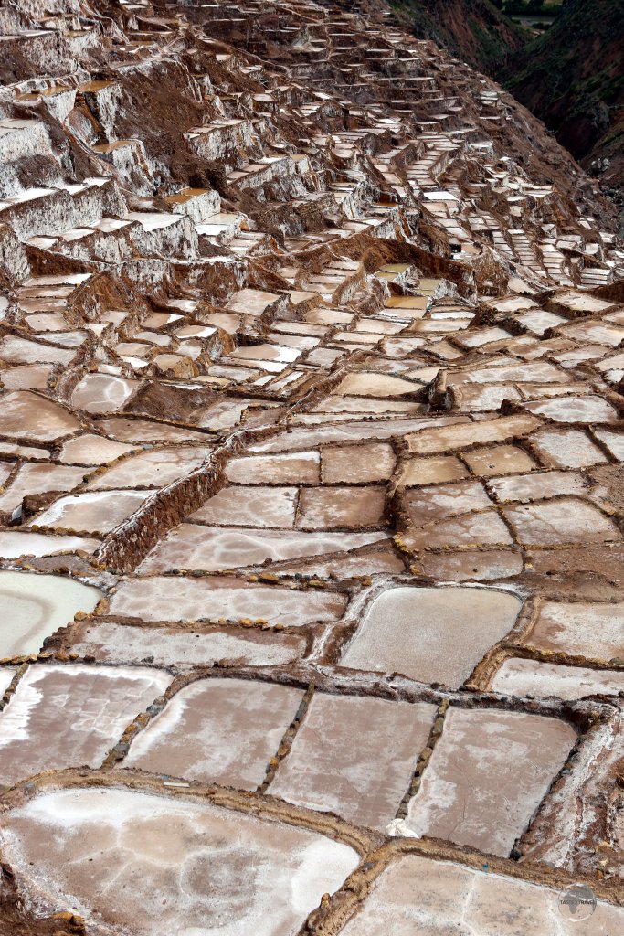 Located in the Sacred Valley, the 'Salineras de Maras', which pre-date the Incas, consist of thousands of small salt pools carved into the mountainside, from which salt is produced.