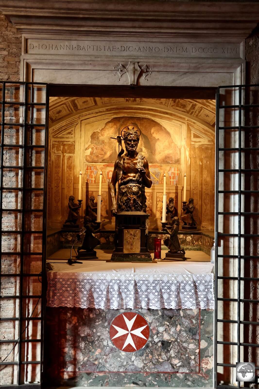 A statue of St. John the Baptist on the altar of the Palatine Chapel.