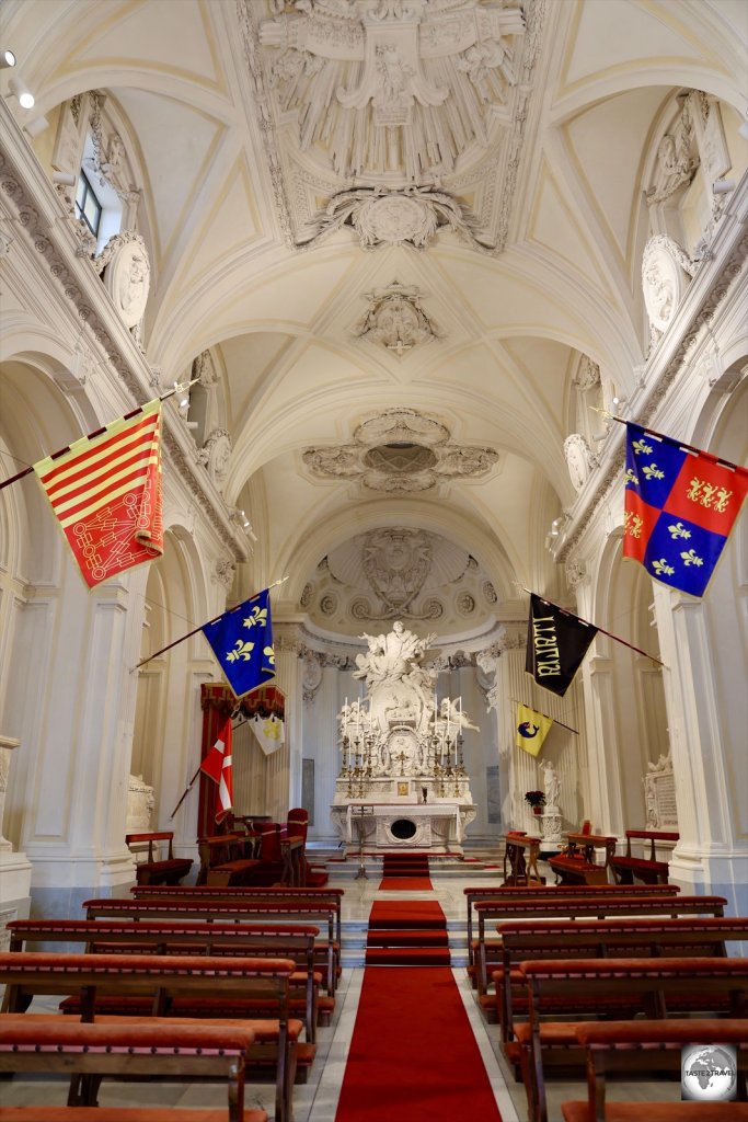 The interior of the church is an explosion of stucco relief, all of which was created by Piranesi.