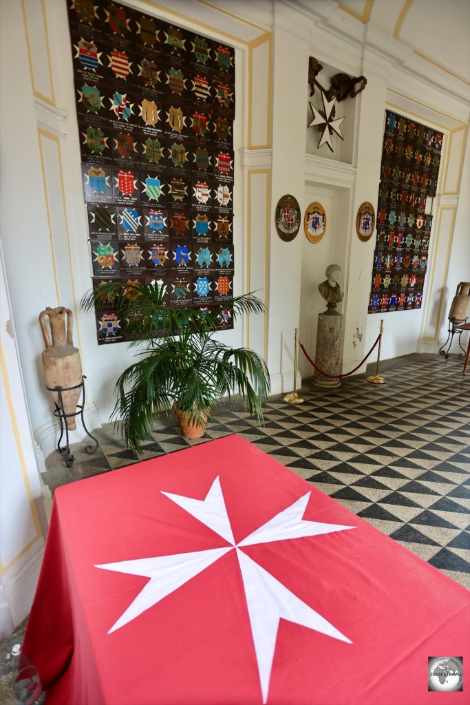 The walls of the garden coffee house display the coats-of-arms of the Professed Knights of the Order of Malta from 1800 to today.