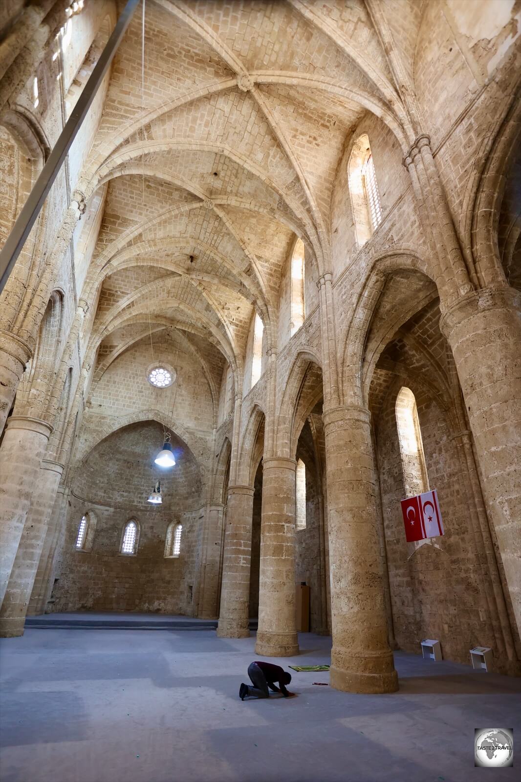 A worshipper inside the Sinan Pasha Mosque, formerly the Saint Peter and Paul church.