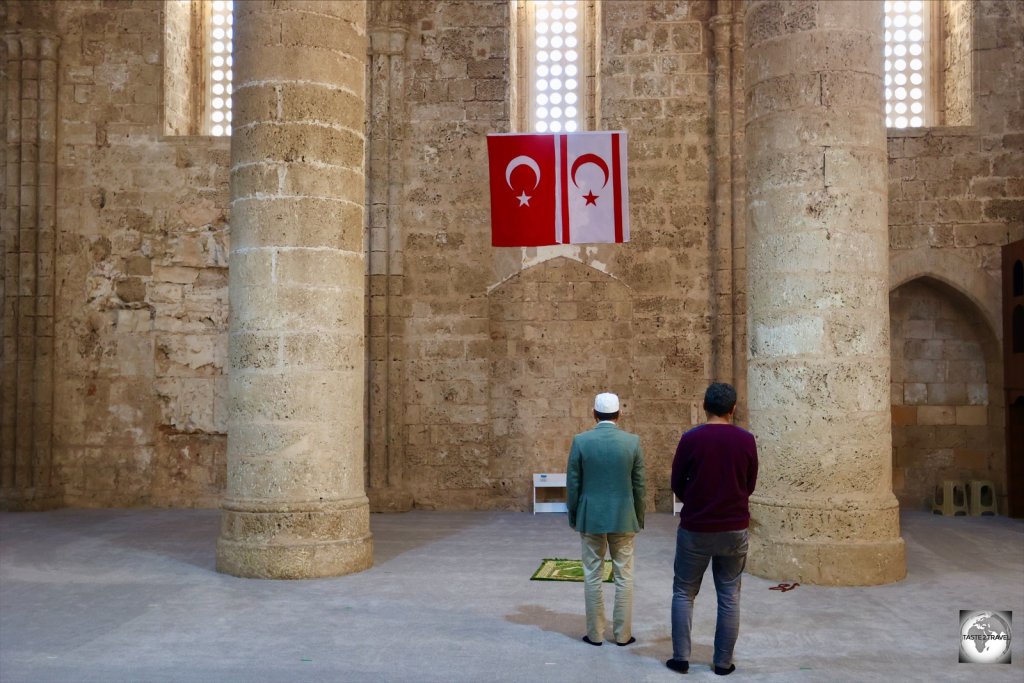 The flags of Turkey and Northern Cyprus inside the Saint Peter and Paul Church (Sinan Pasha Mosque) in Famagusta.