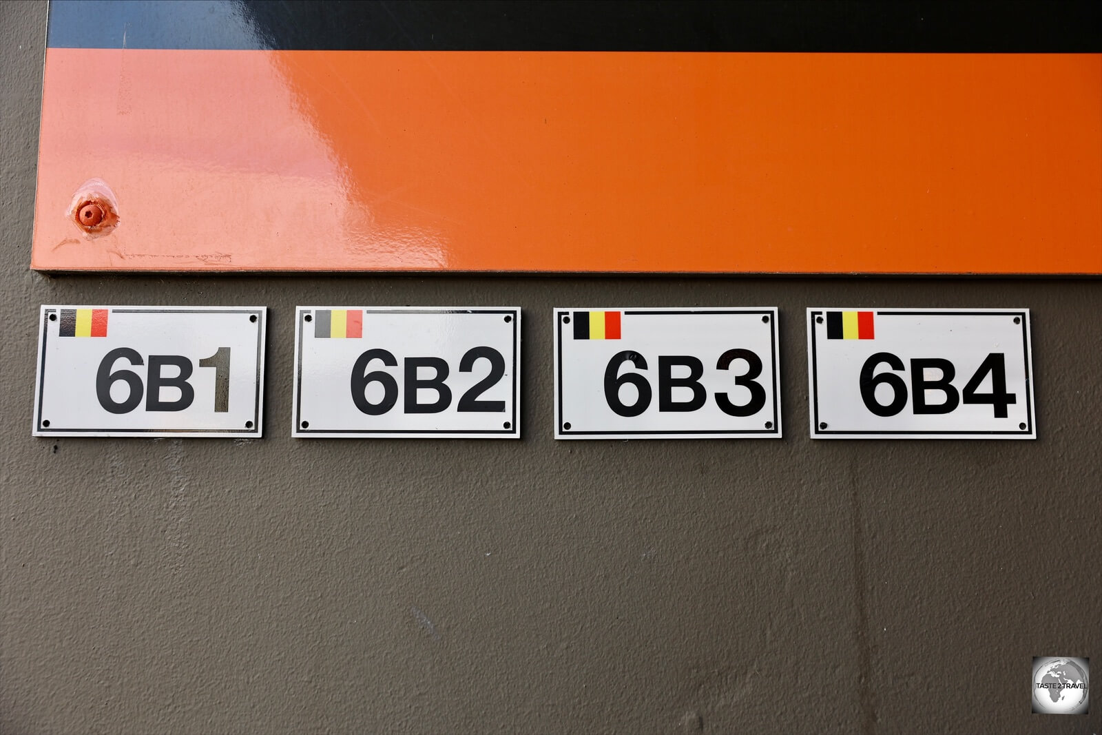 House numbers in Baarle-Hertog feature Belgium flags.