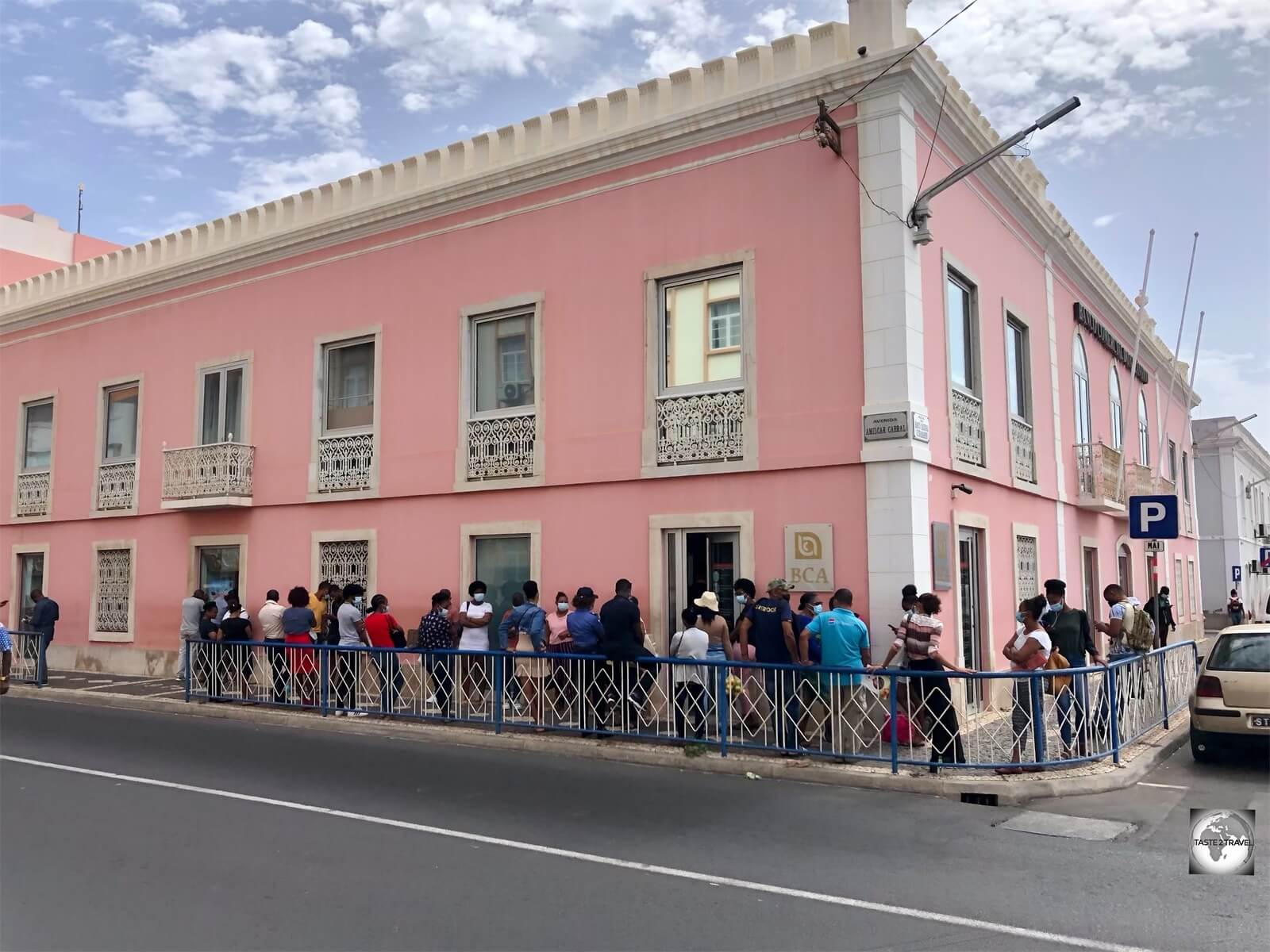 A typical queue, outside a bank in downtown Praia.