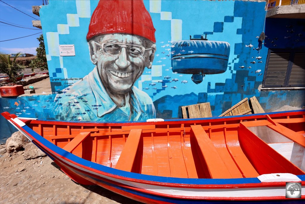 A mural in Porto Mosquito, Santiago island, celebrates a visit to the village by Jacques-Yves Cousteau.
