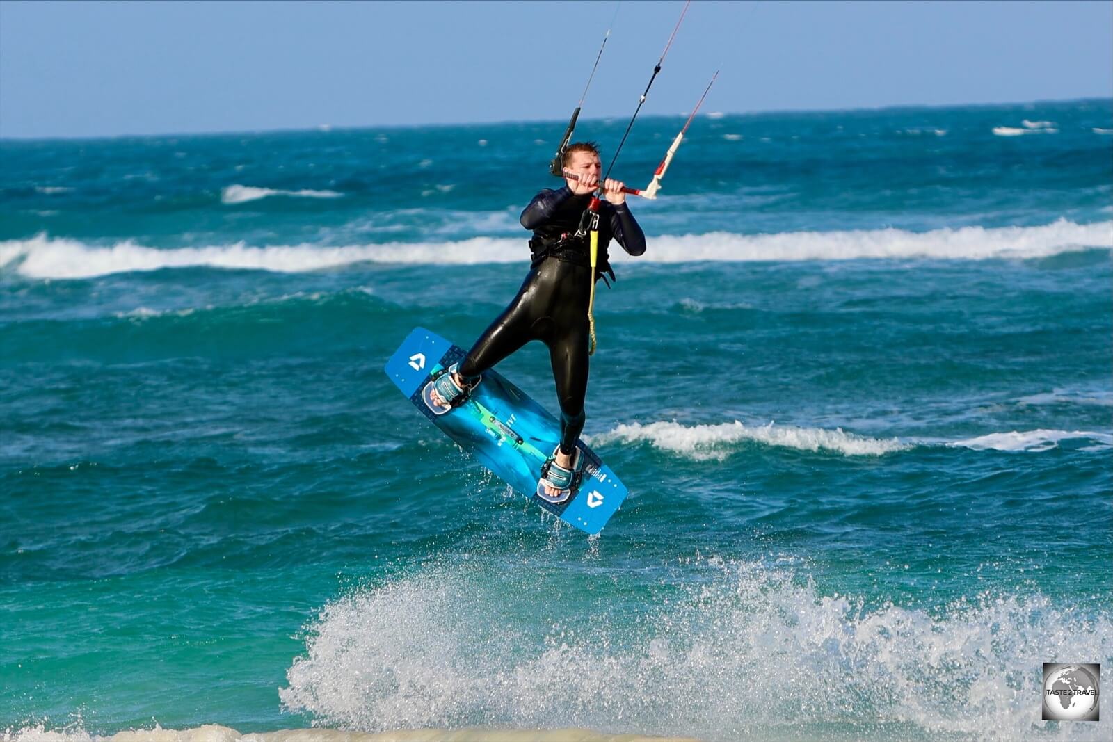 A kite surfer enjoying the breezy conditions at the aptly named Kite beach, a major tourist draw on Sal Island.