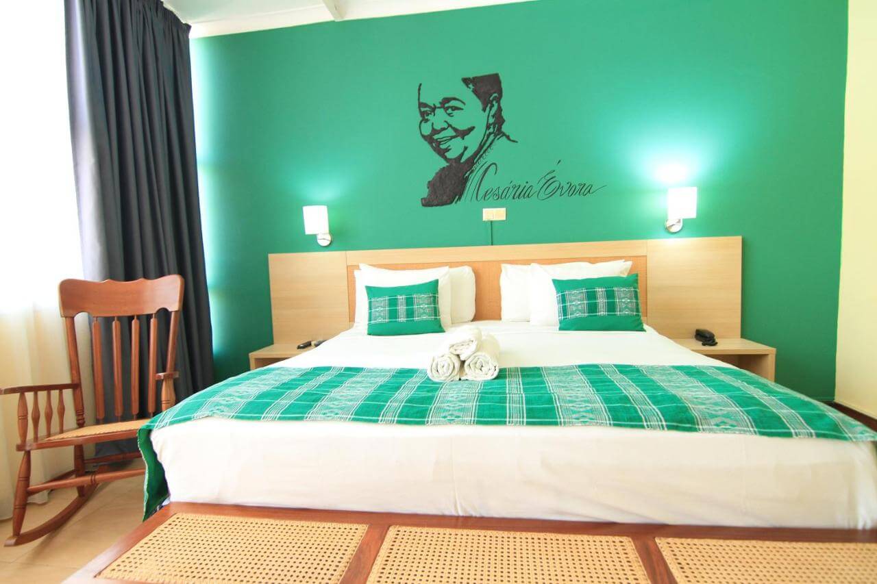 The colourful rooms at the charming Hotel Santa Maria in Praia pay homage to local artists.