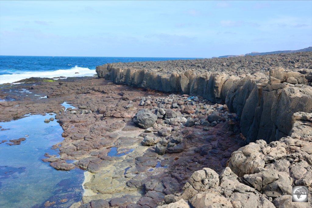 An ancient lava flow adjacent to the Ponta Norte (Farol da Fiúra) lighthouse on the north coast of Sal Island.