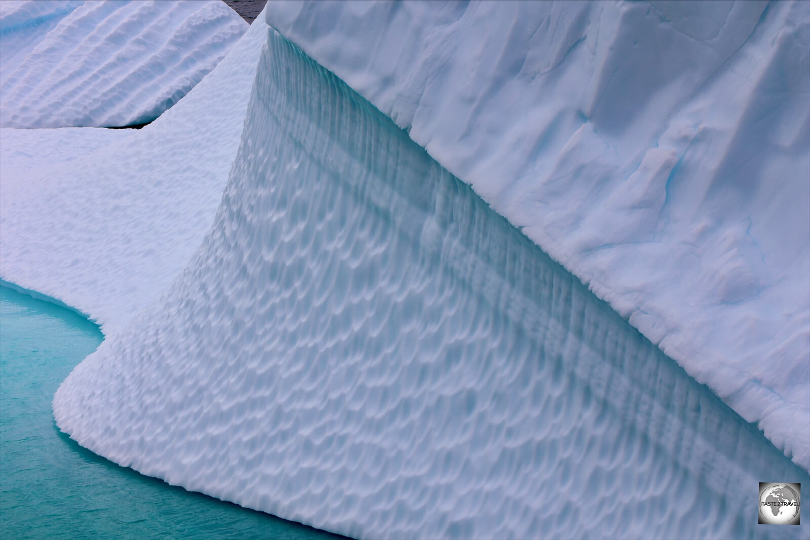 A recently turned iceberg - the rippling effect is caused by the action of sea water when the iceberg is submerged.