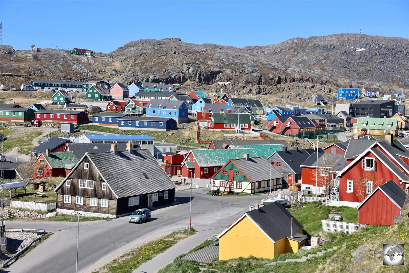 A view of Qaqortoq, the largest town in southern Greenland, with the Qaqortoq Museum (black building) in the foreground.