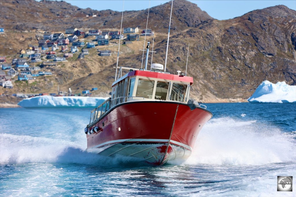 A Disko Line speed boat departing Qaqortoq for Narsaq.