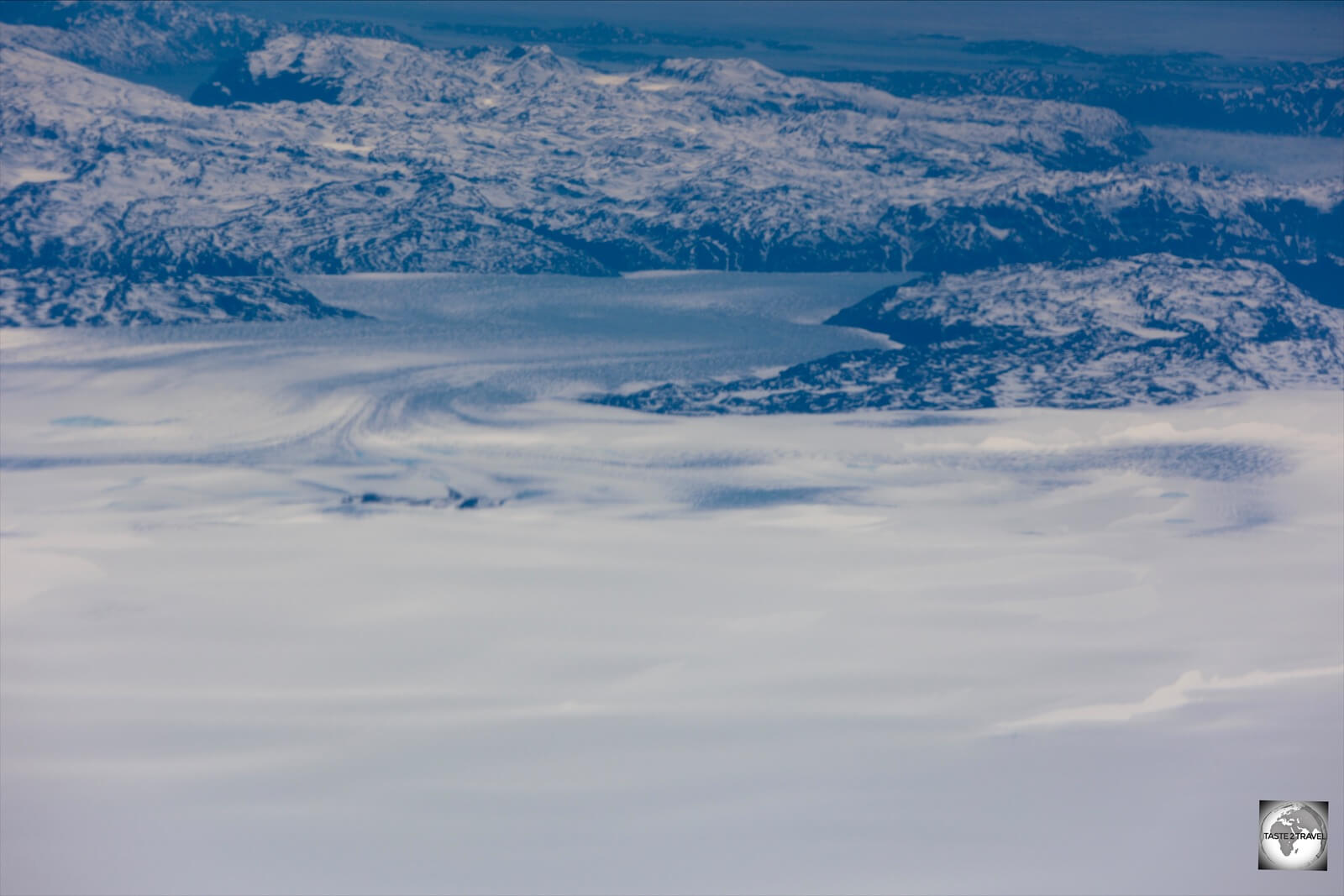 A view of the Greenland Ice Sheet, draining into one of hundreds of glaciers which line the coast of Greenland.