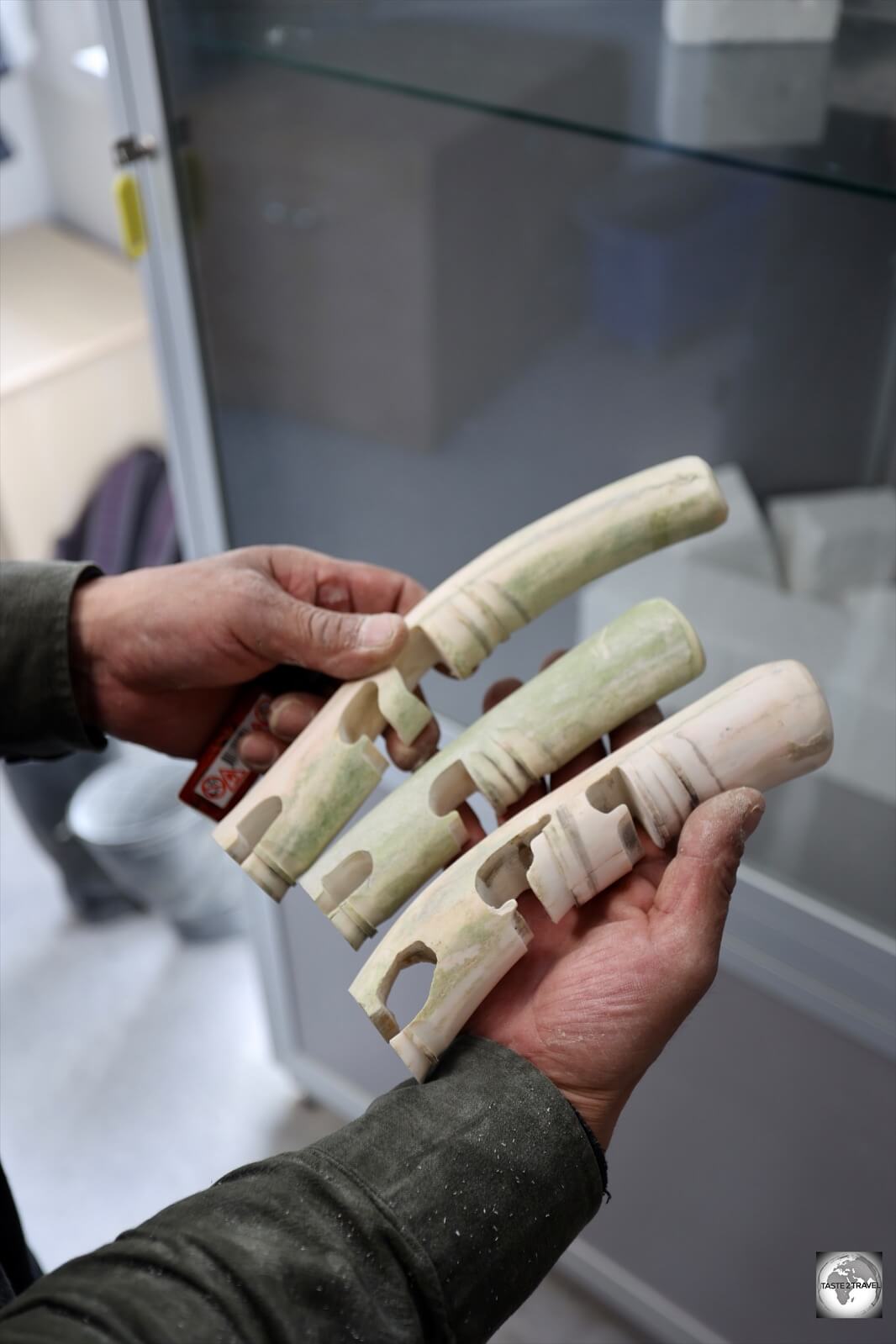 A bone-carver at the Ajagaq workshop was working on these carvings at the time of my visit.