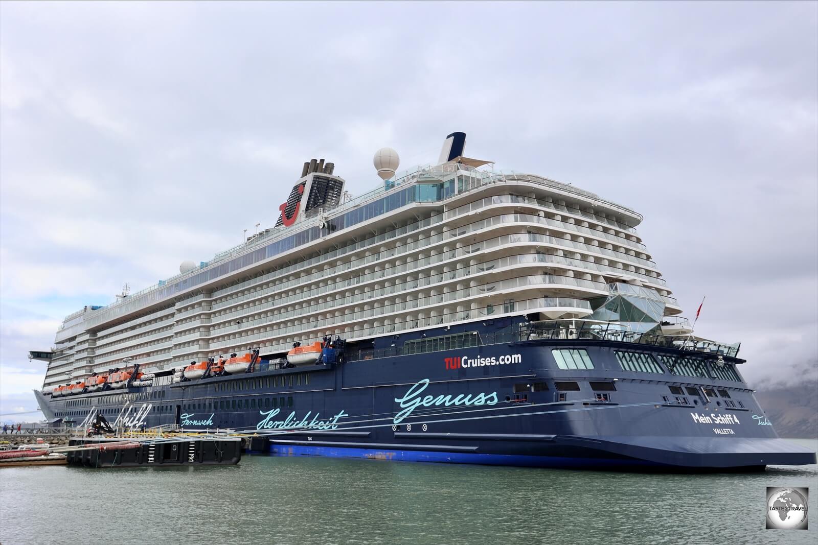 TUI Cruises "MV Mein Schiff 4" in Longyearbyen port. With a passenger capacity of 2,500 - this one ship doubled the population of Longyearbyen during its one-day visit.