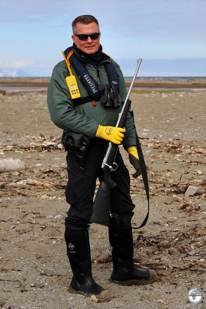 Our Walrus Safari guide, with his loaded rifle, always on the lookout for polar bears.