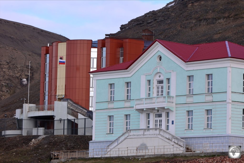 The former Soviet consulate was built in the classic Stalinist style while the new consulate looms in the background.