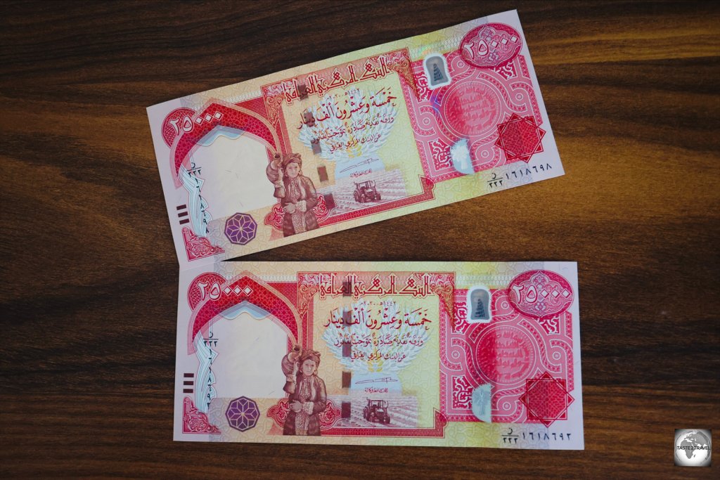 Iraqi IQD25,000 banknotes.