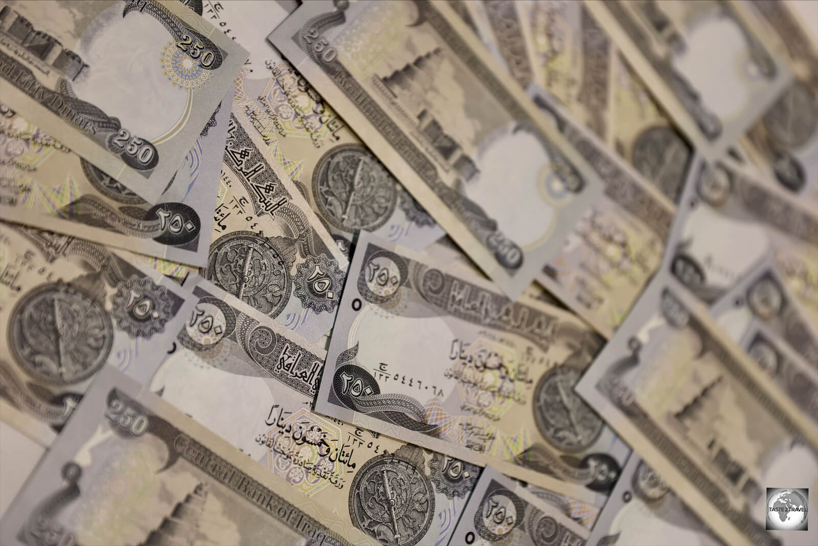 My wad of 100, uncirculated, IQD250 banknotes.