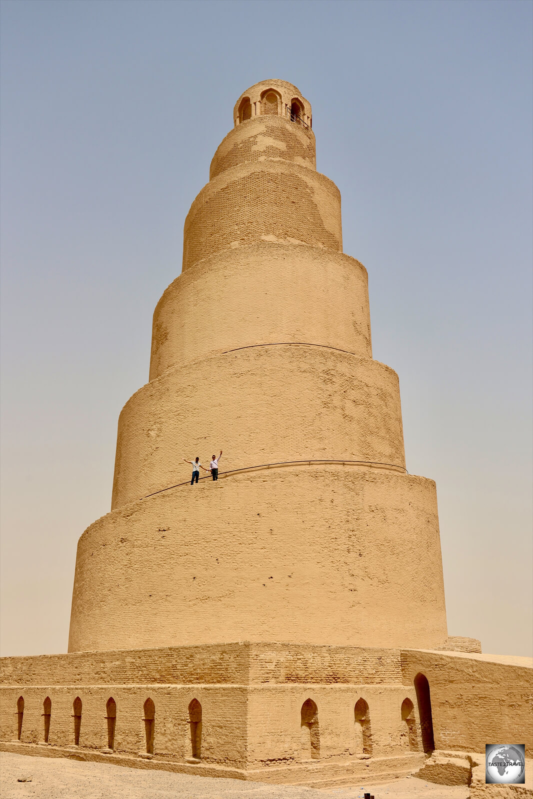 An intrepid Thai traveller, and his Iraqi guide, waving from the Malwiya minaret.