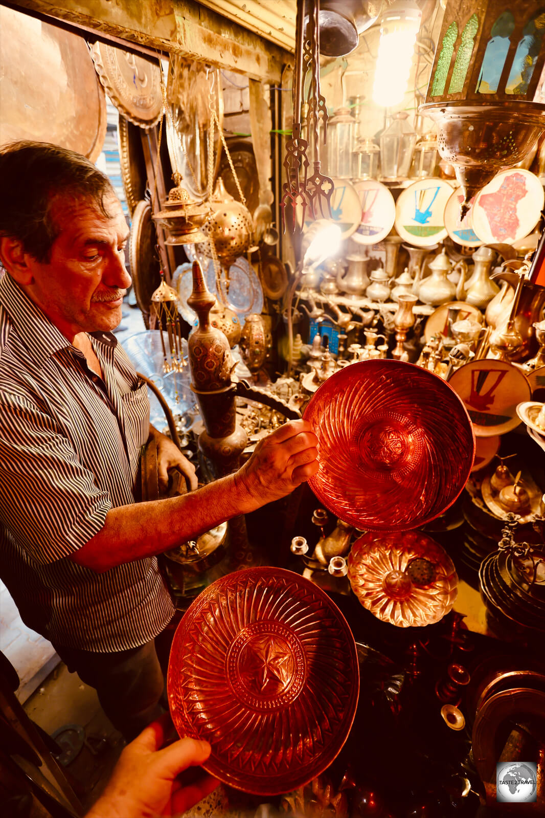 Copper merchant in Baghdad souk.