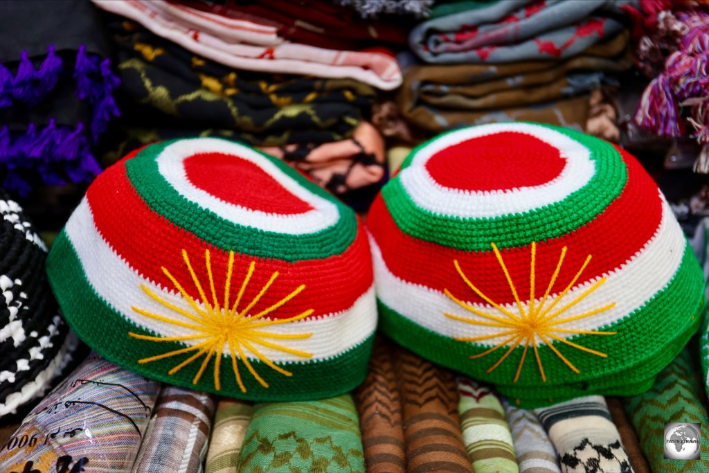 Kurdistan flag skullcaps on sale at Erbil souk.