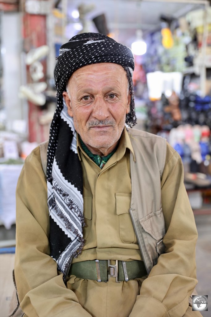 An elderly Kurdish porter at Sulaimaniyah souk.