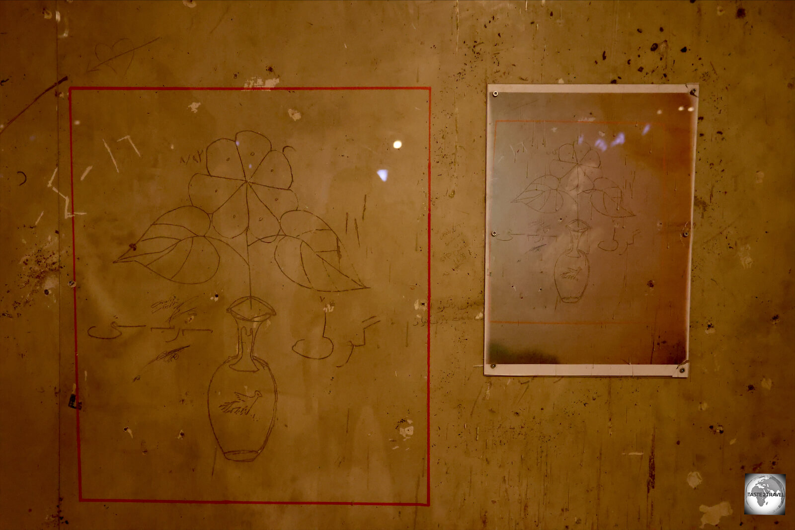 "Vase of Flowers" graffiti, drawn by a former prisoner on the wall of one of the cells inside the jail house at the Amna Suraka museum.