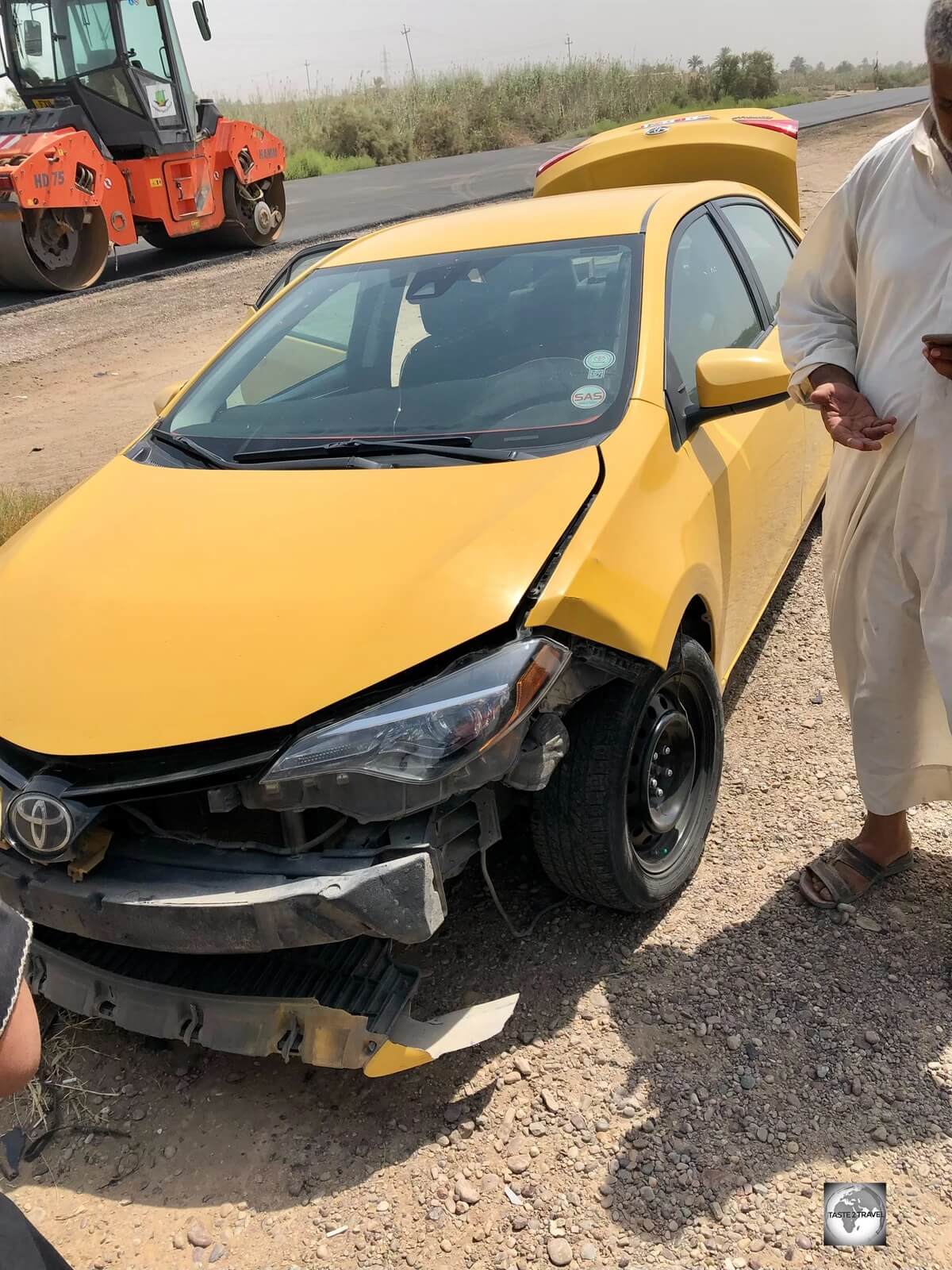 Our damaged taxi, after it was slammed by two runaway tyres.
