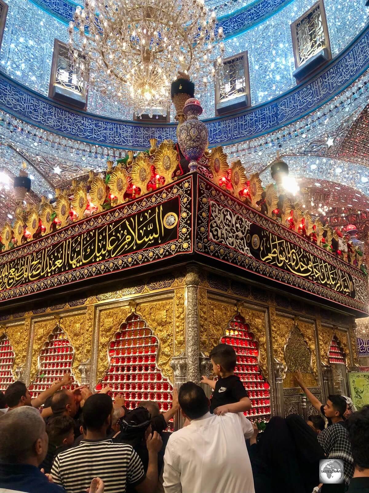 Worshippers praying at the shrine of Abbas ibn Ali.
