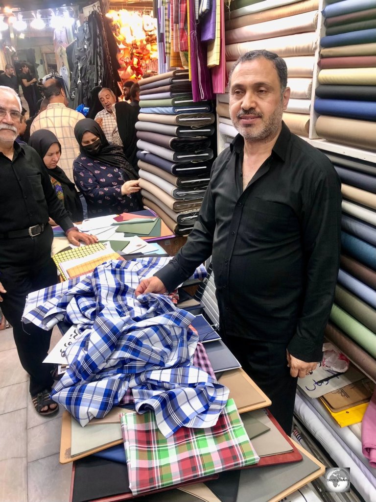 Selecting fine, colourful, cotton fabrics for my latest wardrobe items - a couple of tailored shirts, from a tailor in Najaf souk.