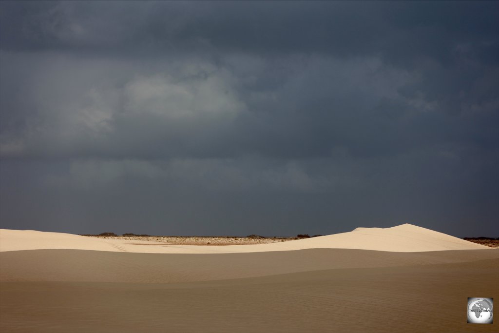 Dramatic skies over the Hayf and Zahek sand dunes.